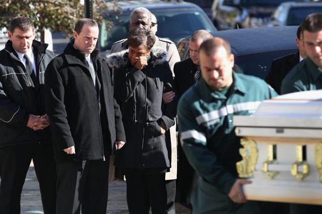Damien and Glenda Moore at their sons' funeral